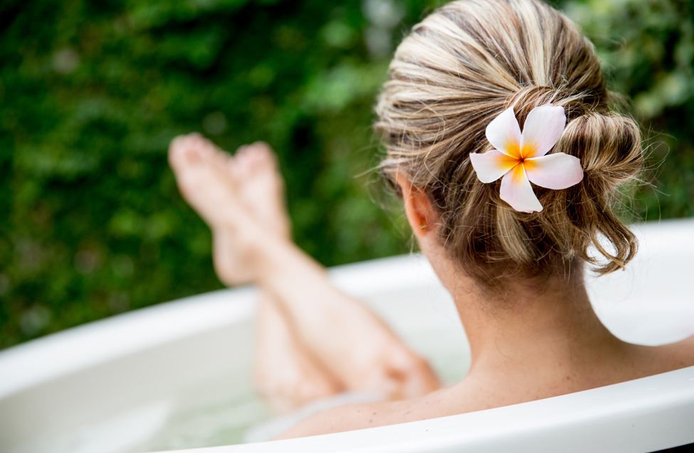 woman relaxing in tub